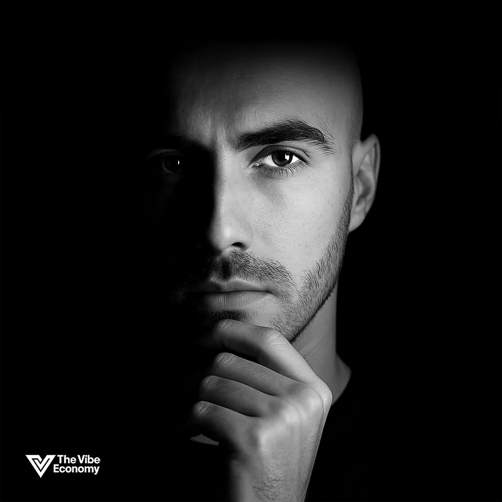 The Vibe Economy - man with intense emotional intensity, black and white image